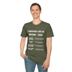 I Survived Life in Britain 2026 T-Shirt — Political Commentary Tee - Our Colours