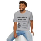I Survived Life in Britain 2026 T-Shirt — Political Commentary Tee - Our Colours