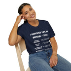 I Survived Life in Britain 2026 T-Shirt — Political Commentary Tee - Our Colours