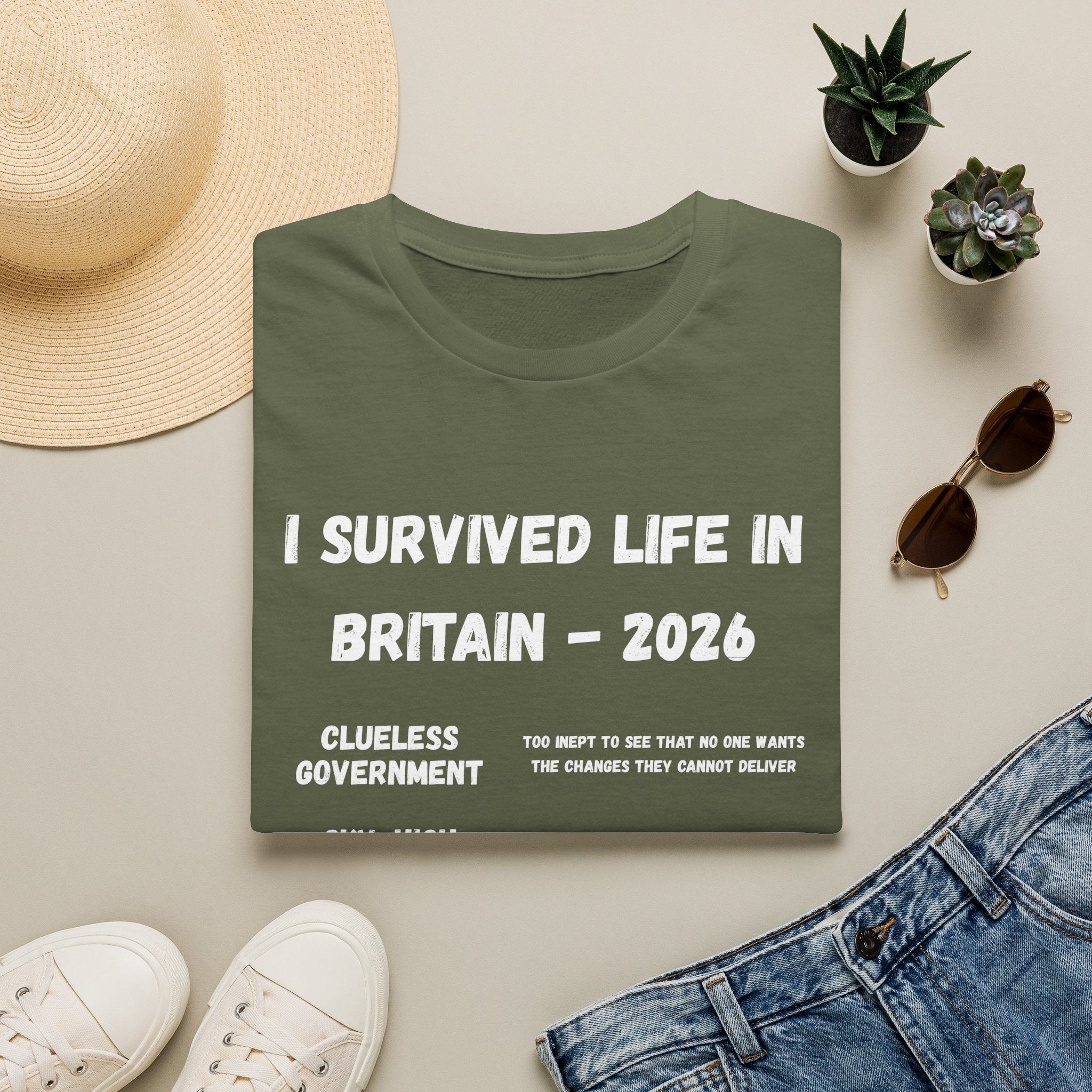 I Survived Life in Britain 2026 T-Shirt — Political Commentary Tee - Our Colours