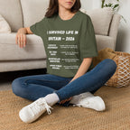 I Survived Life in Britain 2026 T-Shirt — Political Commentary Tee - Our Colours