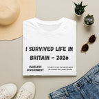 I Survived Life in Britain 2026 T-Shirt — Political Commentary Tee - Our Colours